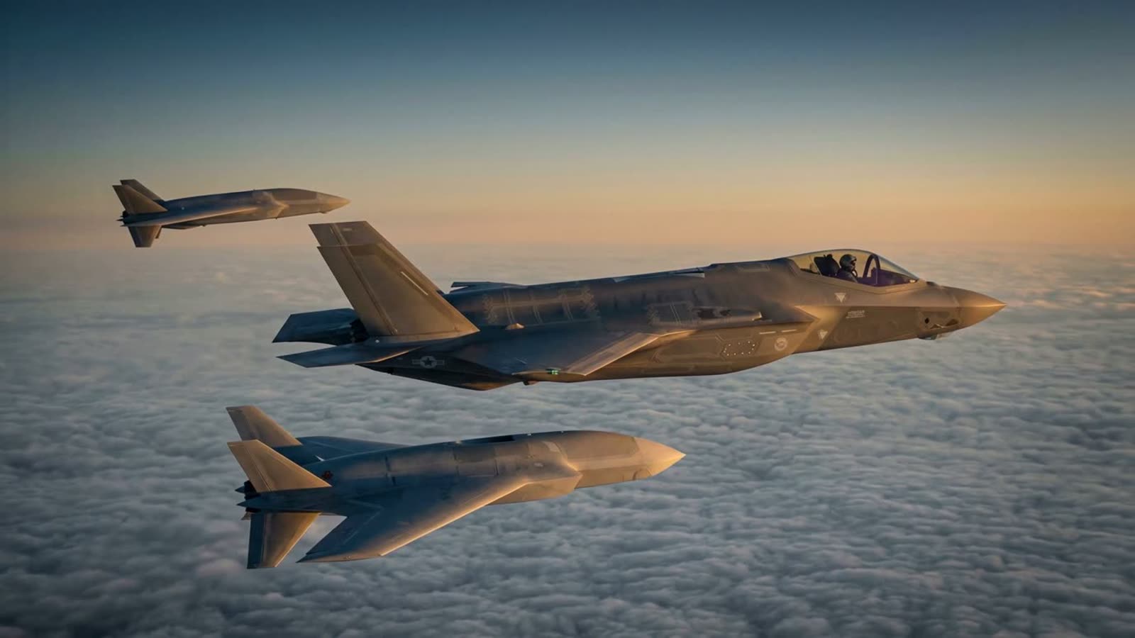 WRAITH, a Fantom uncrewed collaborative combat aircraft, flying in formation with a crewed fighter above cloud